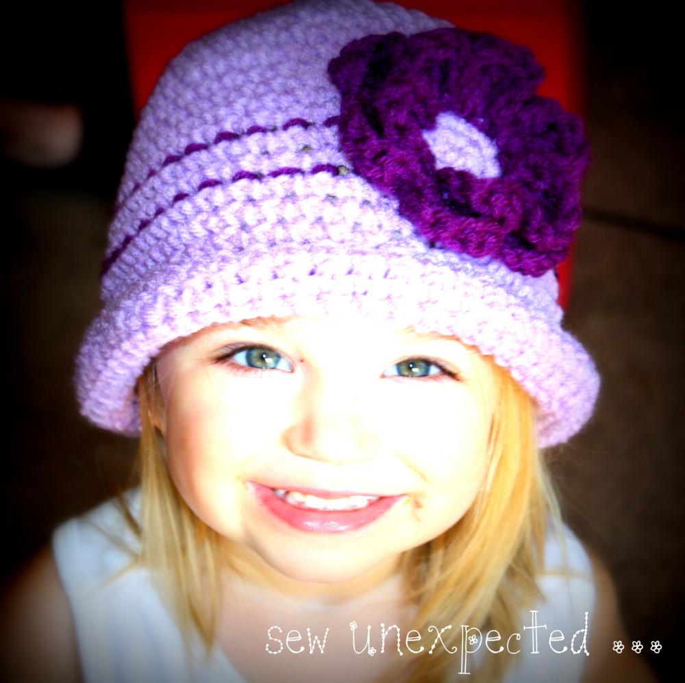 Flower cloche with rolled brim