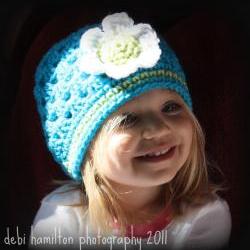 Crochet spring cloche with flower
